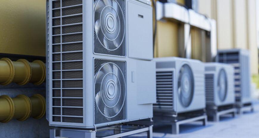 close-up-heat-pump-outside-home close-up-heat-pump-outside-home