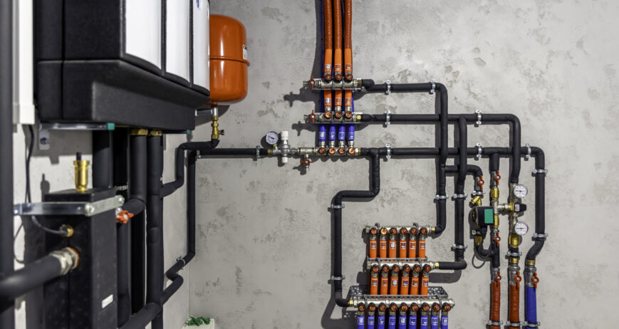 Modern autonomous heating system in the boiler room. A modern electric boiler room. Equipment for modern heating system as a boiler, heater,pipes, expansion tank and other.