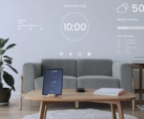 Digital tablet screen with smart home controller on a wooden table